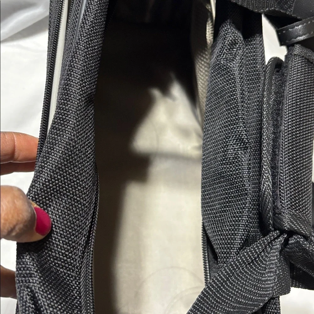 Samsonite Tessera boarding bag with shoulder strap and sleeve. NWT